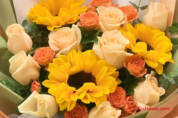 给儿子送花：向日葵+香槟玫瑰的组合花束！